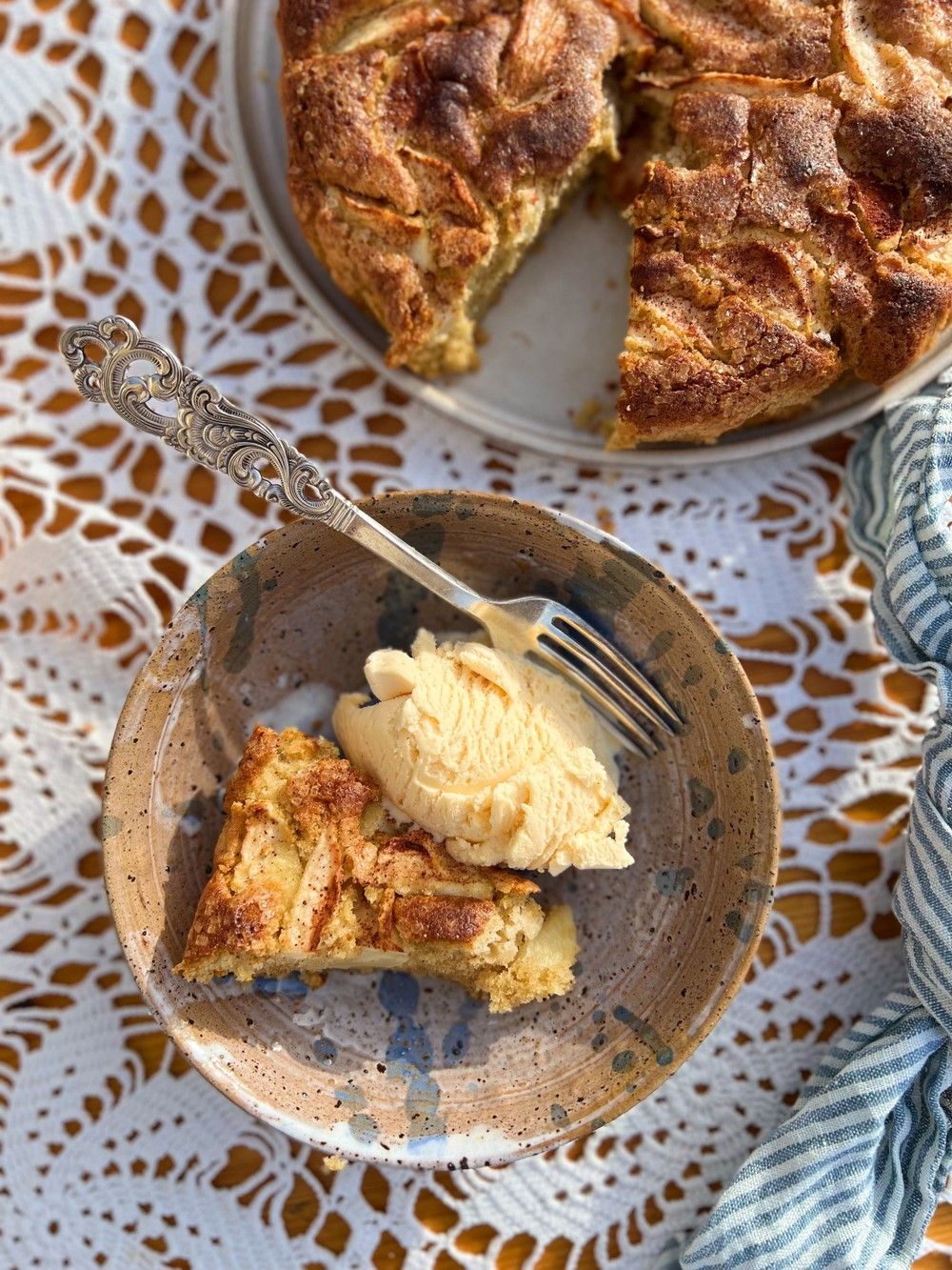 slice of irish bramley apple pie cake on a black plate Stock Photo - Alamy